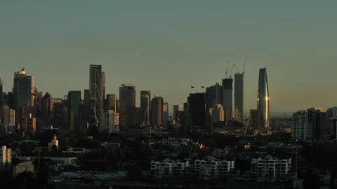 Sun coming down over Sydney modern architecture pan 4K Video stock 290126534