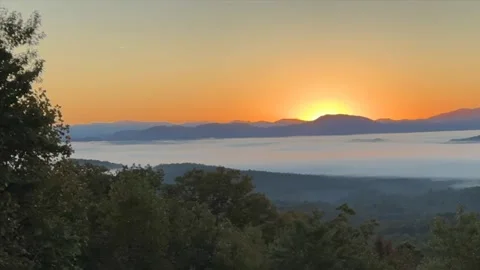 Sun coming up Stock Footage 218459847