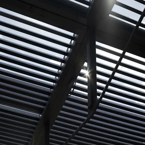 Sun is coming through the blinds on a sun protection roof Stock Footage 69635893