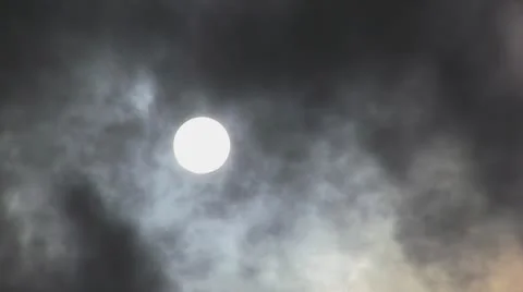 Sun covered by dark cloud Stock Footage 10605919