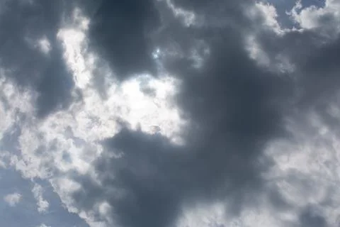 The sun is covered by dark thunderclouds Stock Photos