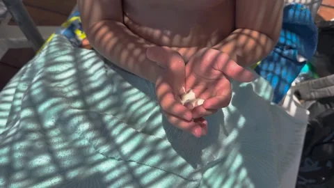 Sun cream concept, Applying sun cream, body milk to children boy in sunny t.. Stock Footage 256245083