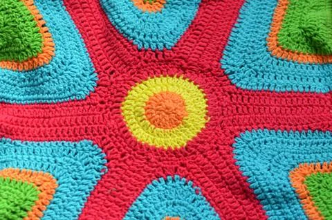Sun crochet Handmade background - freeform crocheting, summer sun background Stock Photos
