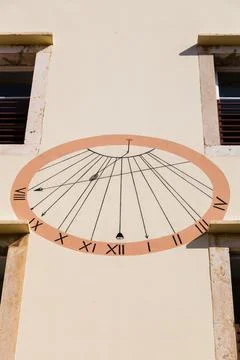Sun dial on a wall in Hvar Town Stock Photos