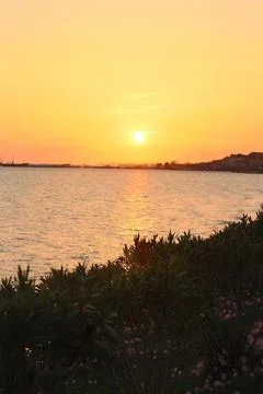 Sun dips below the horizon, it casts a breathtaking palette of warm colors Stock Photos