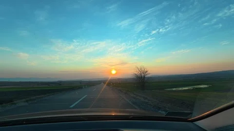 Sun dips low, casting golden glow Видео 331063820