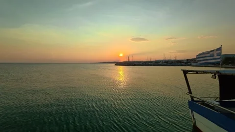 Sun dips low over calm, turquoise waters. Nikiti, Greece Stock Footage 338347297