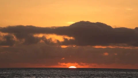 Sun disappears into ocean Stock Footage 111230031