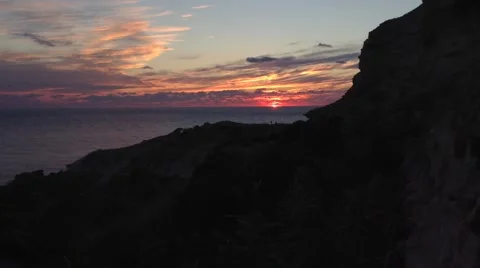 Sun down mountains and clouds At Fiolen Cape Crimea Russia Stock Footage 68387659