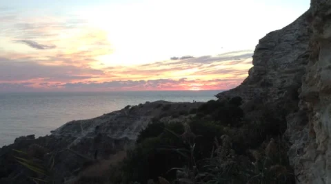 Sun down mountains and clouds At Fiolen Cape Crimea Russia 2 Stock Footage 68387694