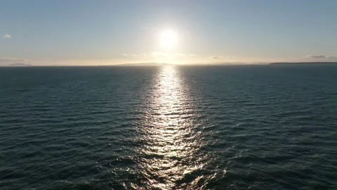 Sun down on the sea with horizon line view by the drone camera Stock Footage 169686368
