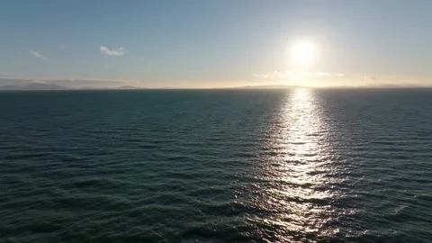 Sun down on the sea with horizon line view by the drone camera Stock Footage 169686449