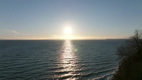Sun down on the sea with horizon line view by the drone camera Video stock 169686540