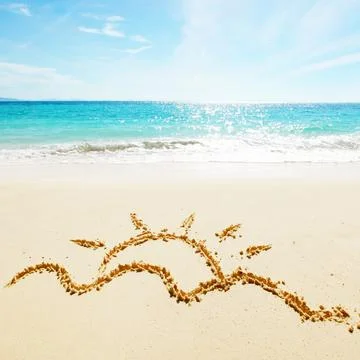 Sun drawing on a beach Stock Photos