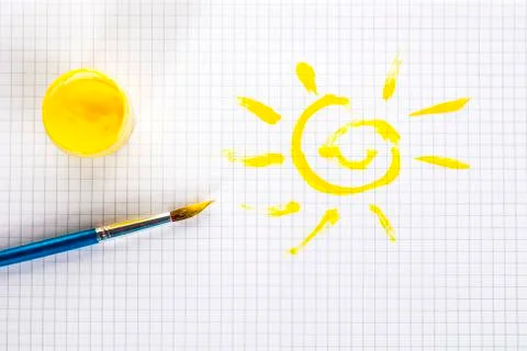 The sun is drawn in a notebook Fotos de archivo