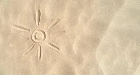 Sun drawn on the sand with copy space,Summer concept banner Stock Photos