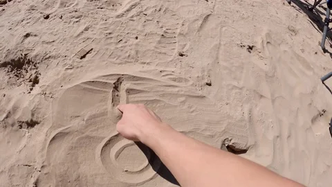 The sun drawn on the sand Stock Footage 171444721