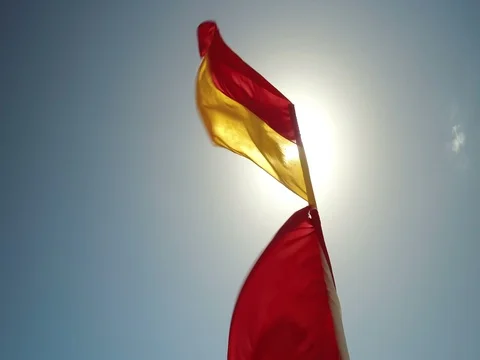 Sun drenched flags Stock Footage 72911865