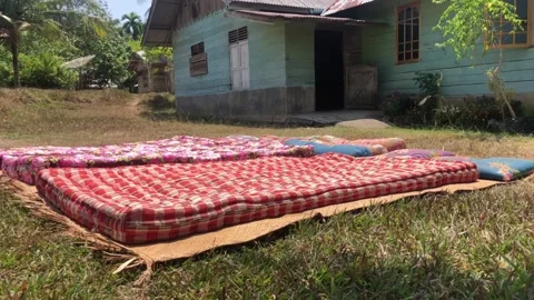 Sun-dried mattress Stock Footage 236541201