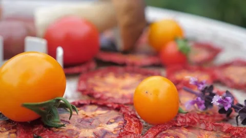 Sun Dried Tomatoes from a dehydrator. Composition with mushrooms and basil. Stock Footage 147012663