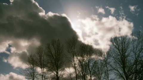 Sun emerges from cloud Stock Footage