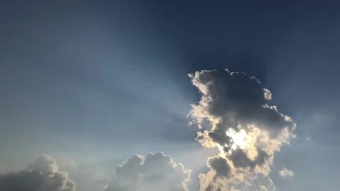 The sun emerges from clouds Stock Footage 144856990