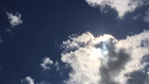 The sun emerges from clouds Stock Footage 144857041