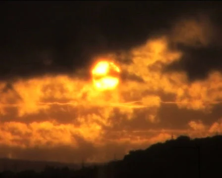Sun exposing out of clouds Video stock 83471
