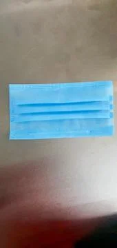 The Sun Face masks can increase risk of catching coronavirus Stock Photos