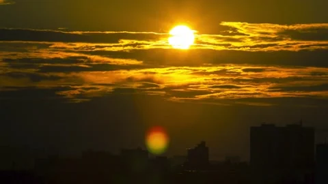 Sun fall dramatic clouds sunset timelapse Stock Footage 135673292