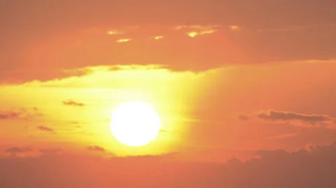 Sun falls out into clouds silhouette time lapse sunset (close) HD 1080 30fps Stock Footage 39886716