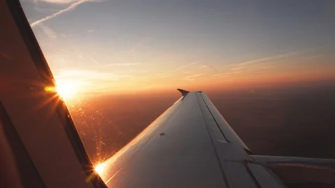 Sun Flare Over Airplane Window, Passenger POV View Stock Footage 97922658