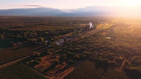 Sun Flare Over Cafayate Town at Golden Hour Argentina Stock Footage 332229600