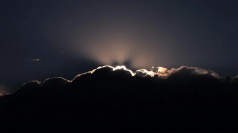 Sun flare pops over clouds Stock Footage 60756347