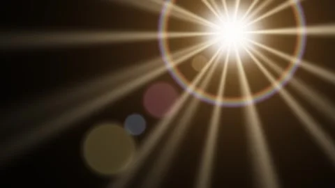 Sun flare with rays light leak overlay on black background 库存影片 348280482