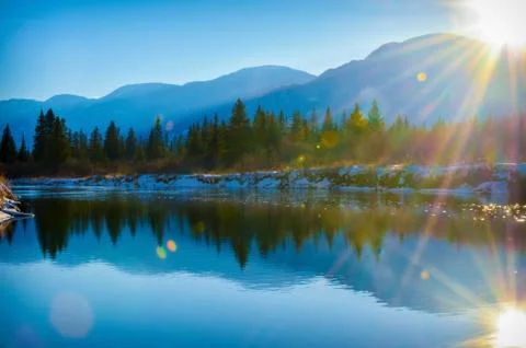 Sun flare reflection winter landscape Stock Photos