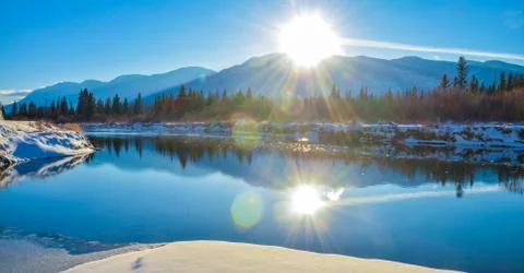 Sun flare reflection winter landscape Stock Photos