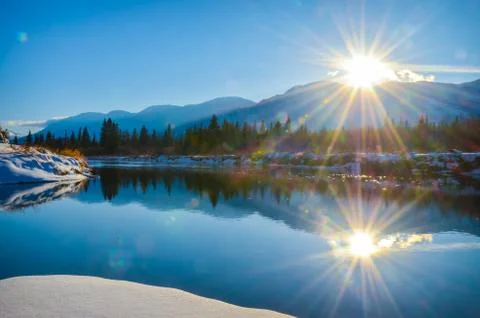Sun flare reflection winter landscape Foto stock