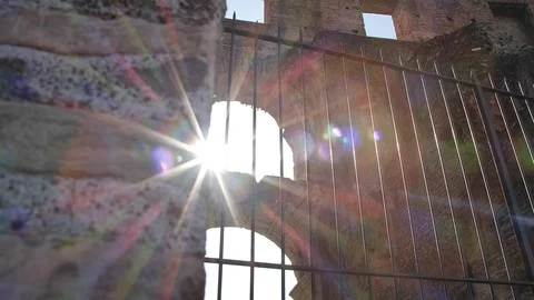 Sun flare through bars HD Stock Footage 129014770