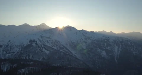Sun Flared Drone Shot Of Sun Behind Mountains Stock Footage 140320771