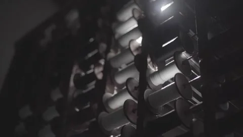 Sun Flares of spinning thread in Weaving loom machine Stock Footage 248799141