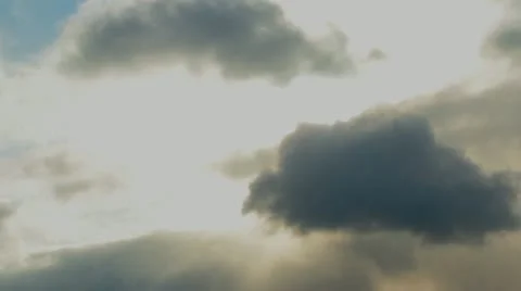 Sun flying through the clouds Stock Footage 22285450