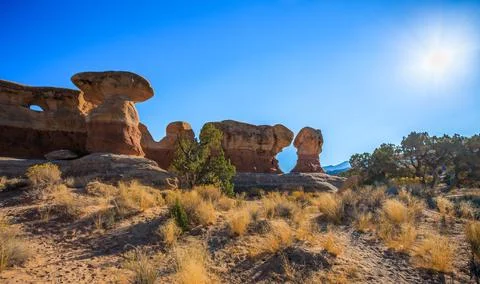 Sun on the Formations at Devil's Garden, Hole in the Wall Road, Grand Staircase Stock Photos
