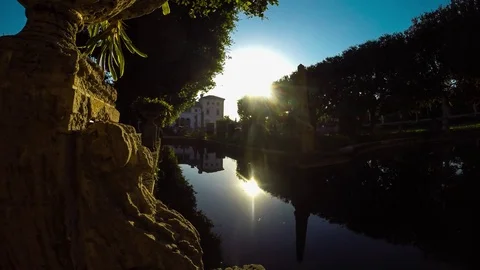 Sun fountain reflection timelapse Stock Footage 78678132