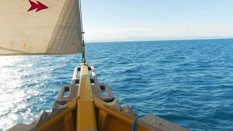 Sun in Front of the Sail Boat Stock Footage 74179598