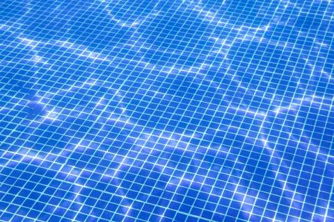 Sun glare at the bottom of the pool Stock Photos