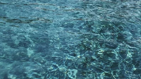 Sun glare in a pool water. 库存影片 137803206