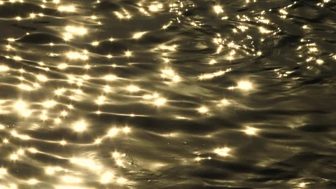 Sun glare in the river or the ocean at sunset, natural background, 4K Stock Footage 113073477