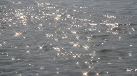 Sun glare on the water flowing Stock Footage 61284226