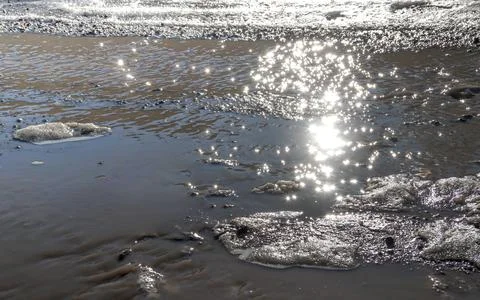 Sun glare on the water Stock Photos